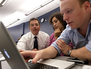 Photo of students and teacher working at a computer. Link to Gifts by Estate Note. Photo of students and teacher working at a computer. Link to Gifts by Estate Note.